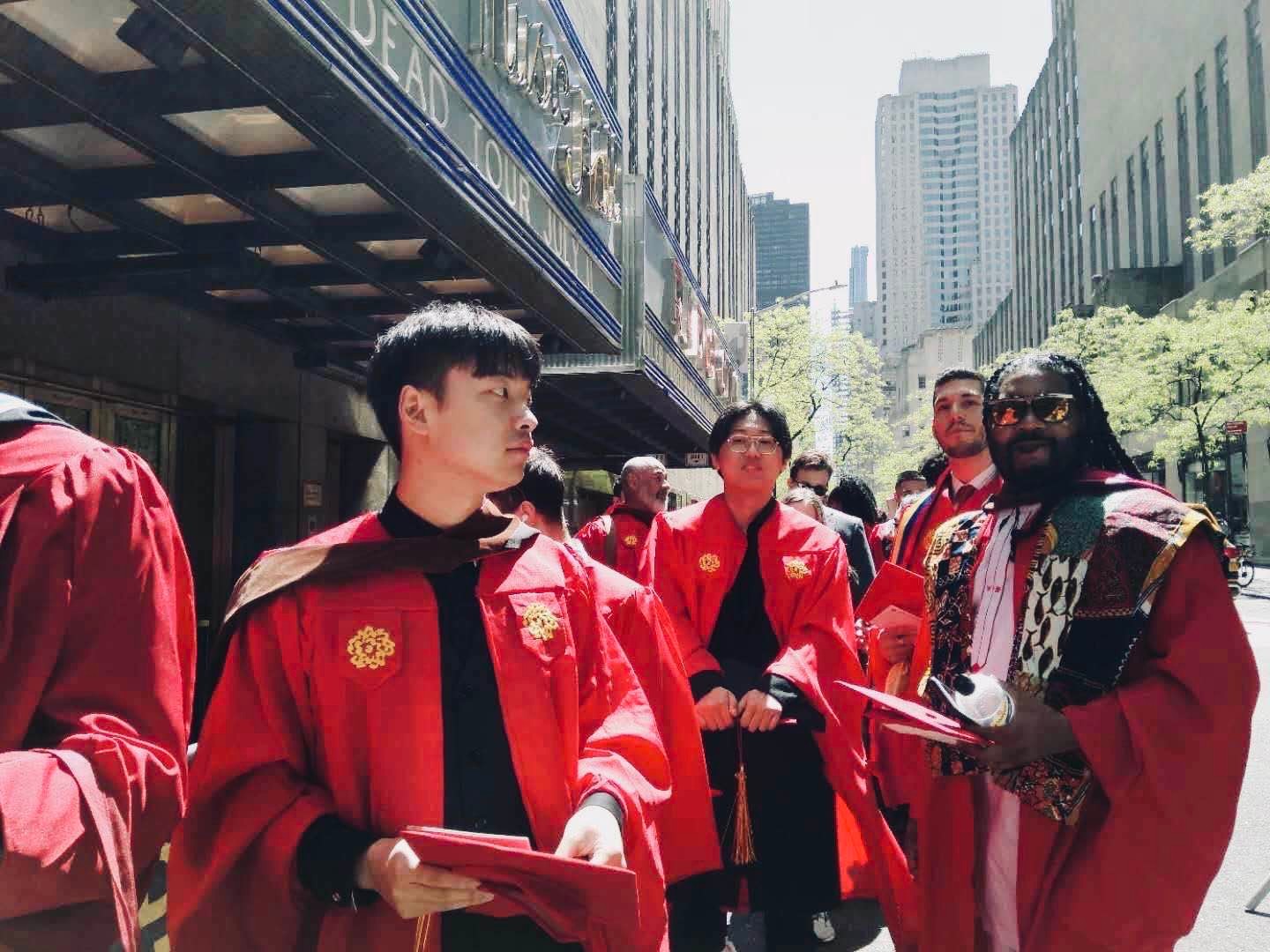 Shuai Xu at graduation in New York City